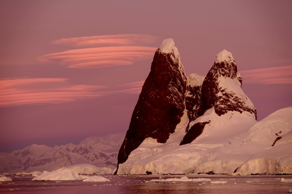 Antarctic mountains in pink evening light